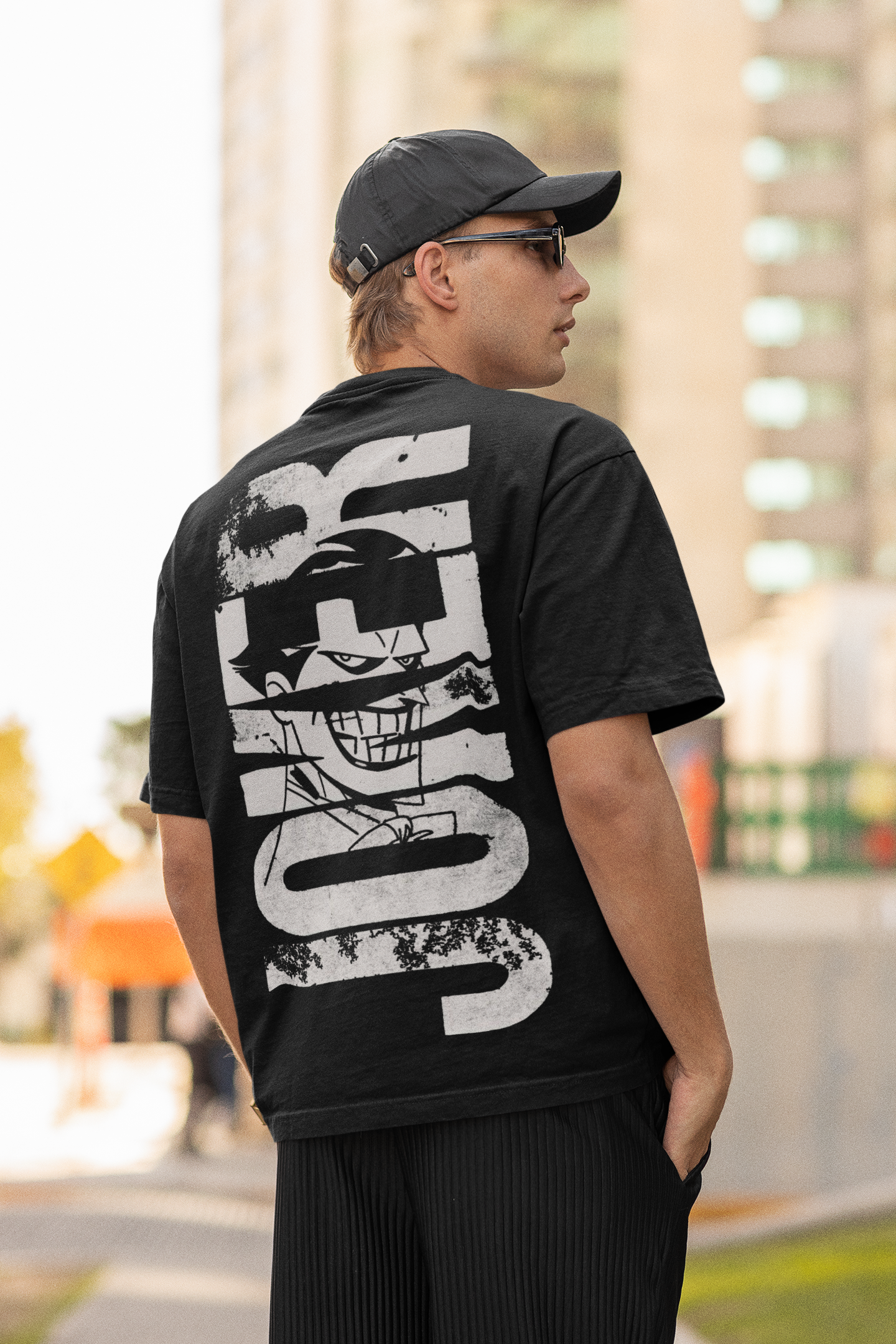 back-view-mockup-of-a-man-wearing-an-oversized-t-shirt-and-sunglasses-m25264
