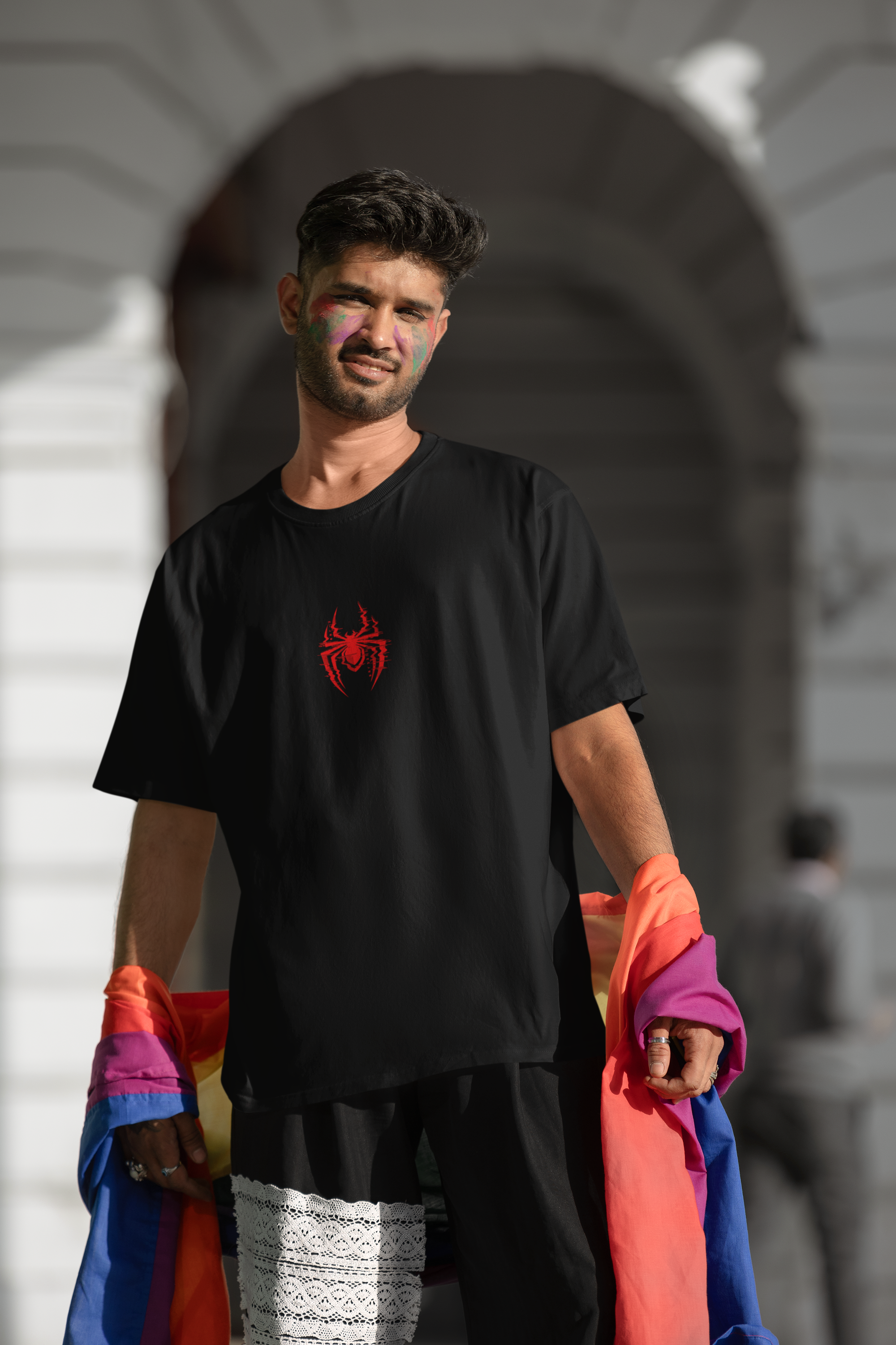 blinkstore-t-shirt-mockup-of-a-man-with-a-painted-face-to-celebrate-pride-month-m39089