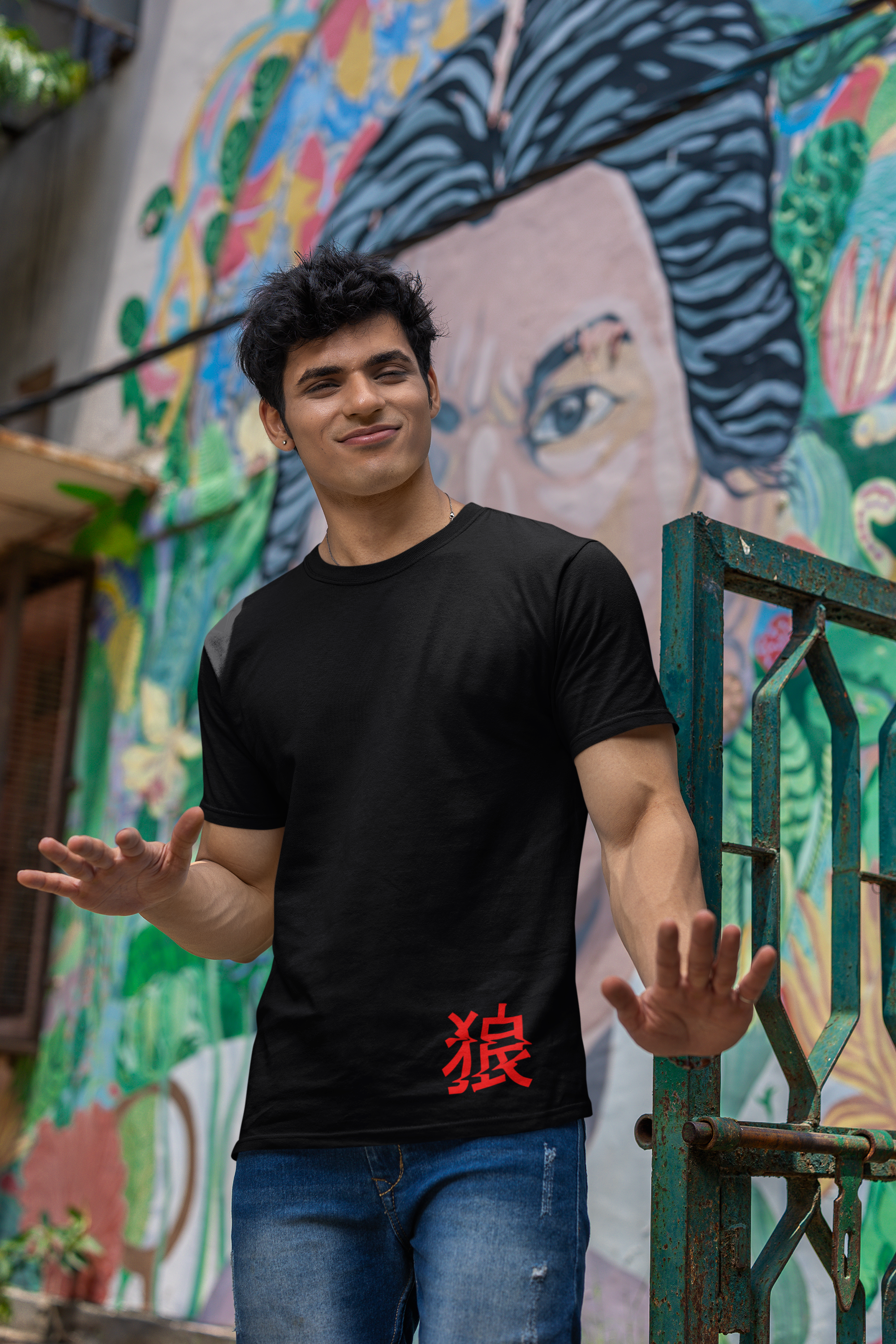 gildan-t-shirt-mockup-of-a-man-standing-in-front-of-a-painted-wall-m39287 (1)